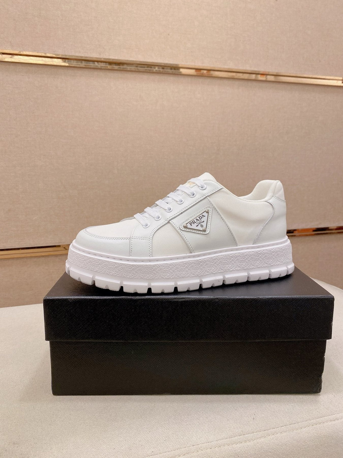 Prada Triangle Plaque Low-Top Sneakers - Treaded Rubber Sole